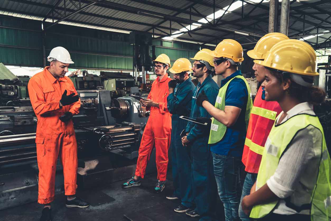 factory workers standing in a line