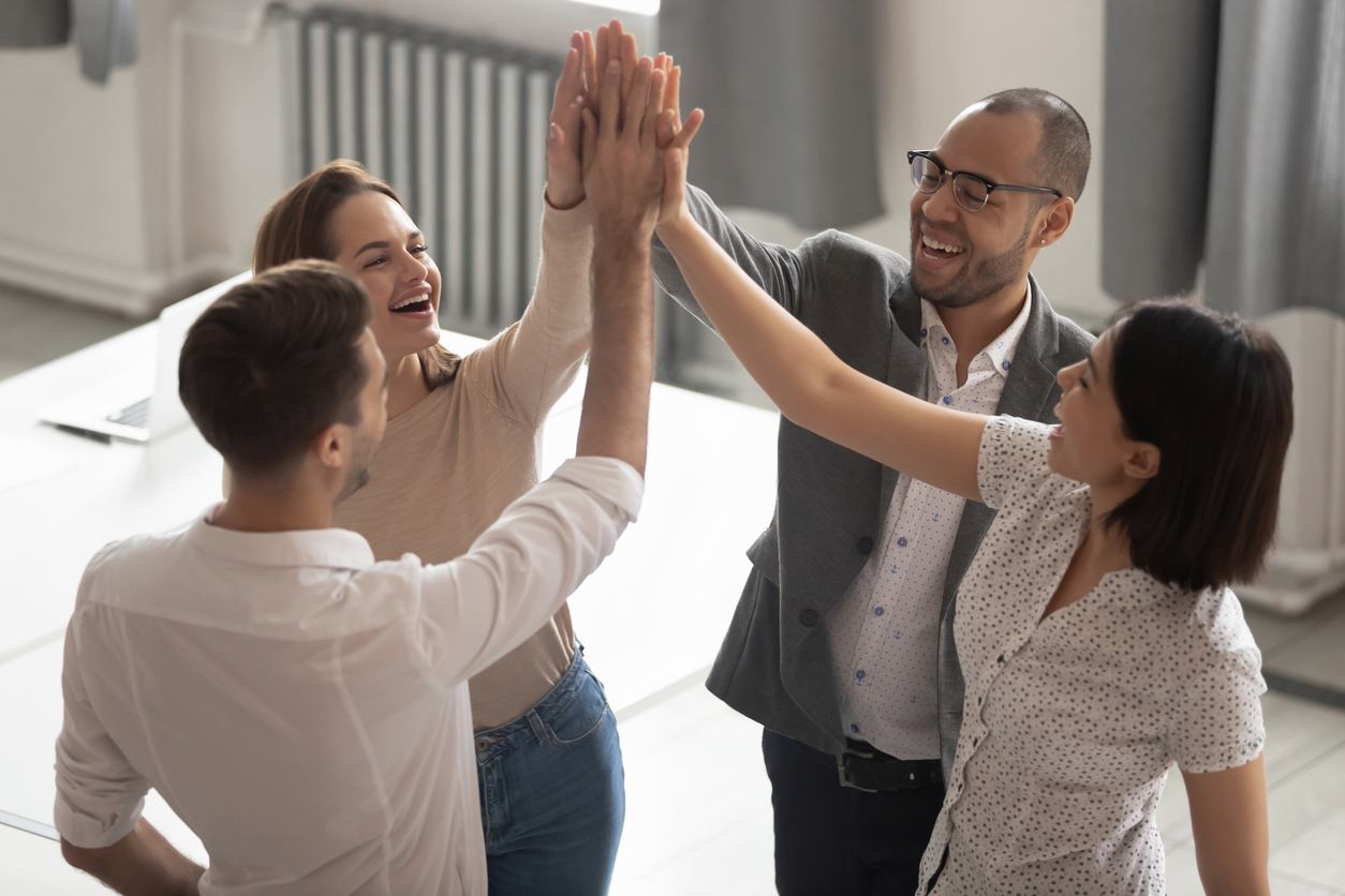 coworkers in a group celebrating