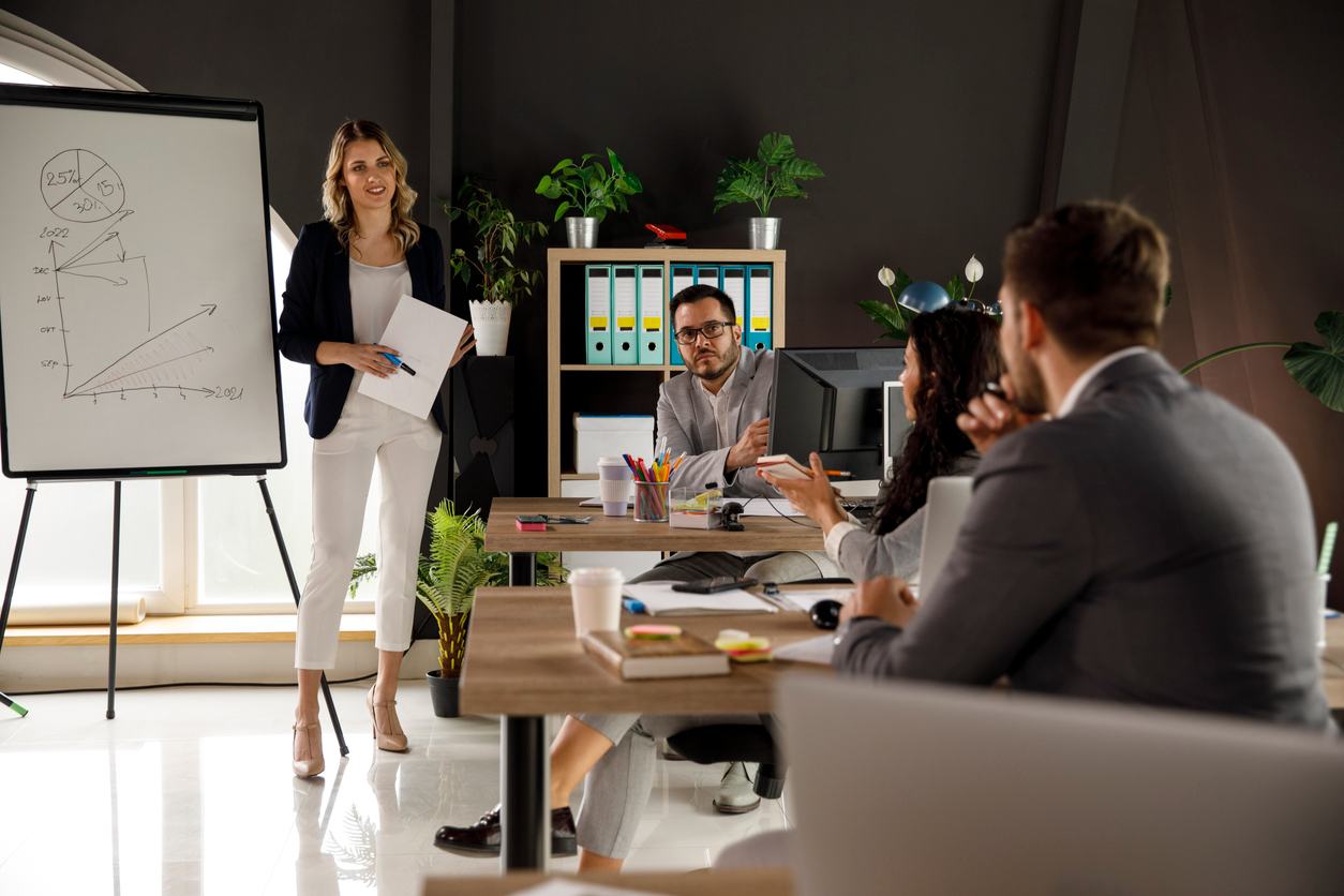 Coworkers having a discussion during a business meeting stock photo