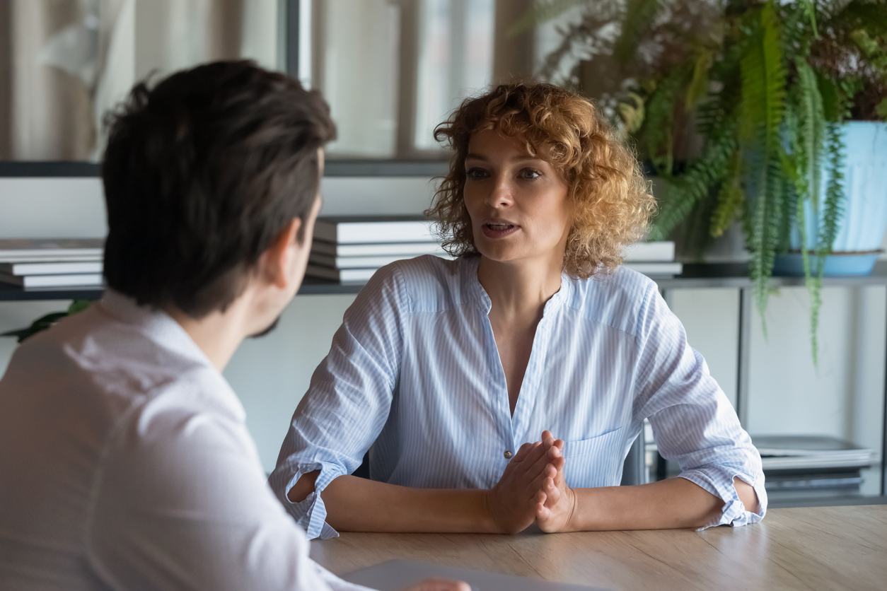 Two business coworker in discussion