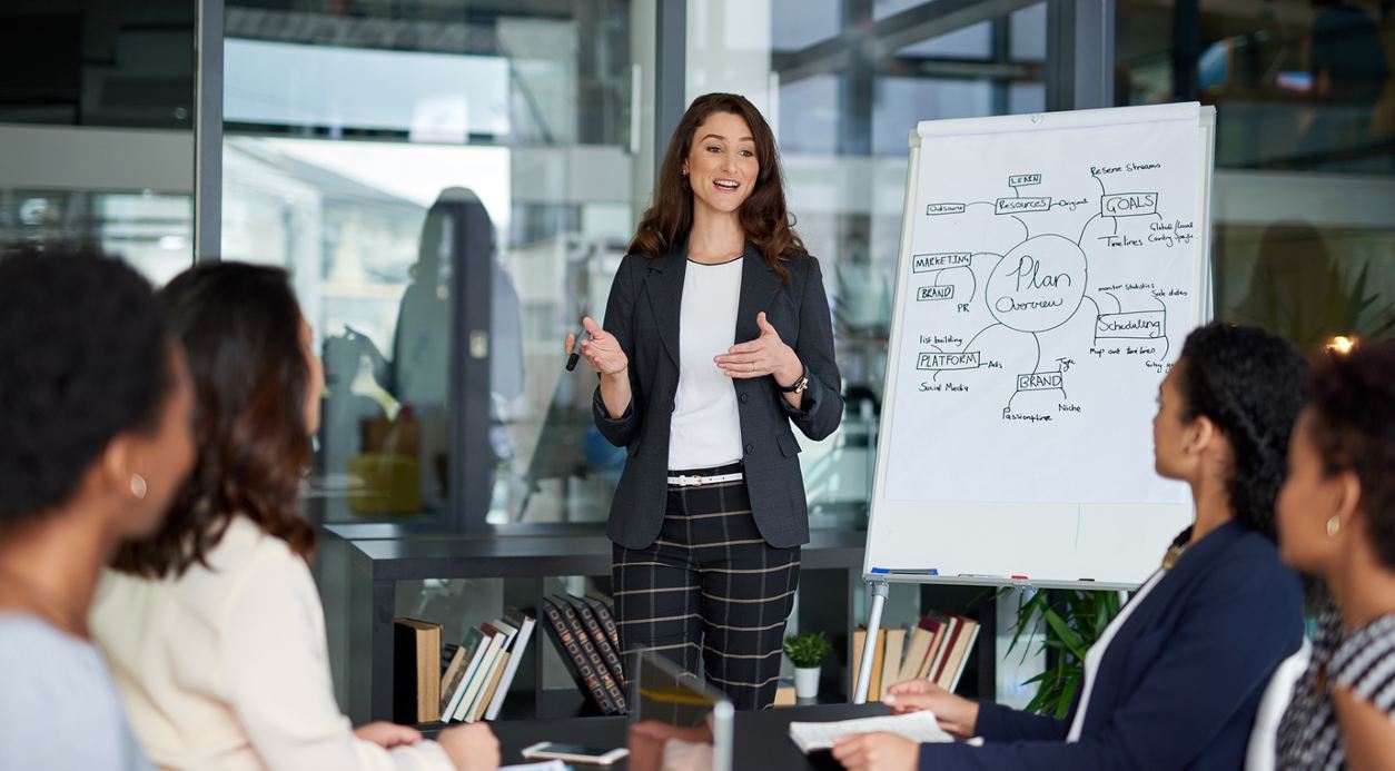 Shot of a young businesswoman giving a presentation in the boardroom