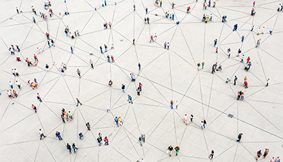people walking around a connected path