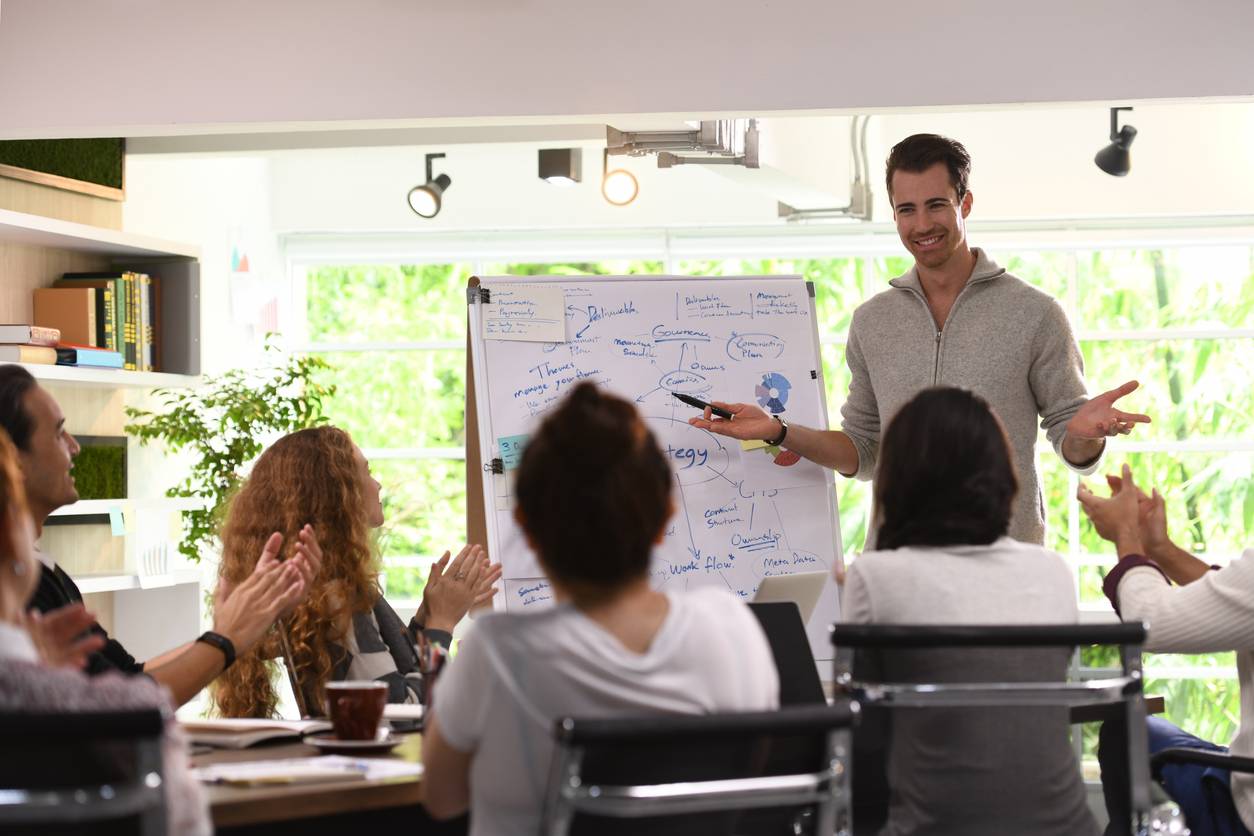 leader delegating to group of employees