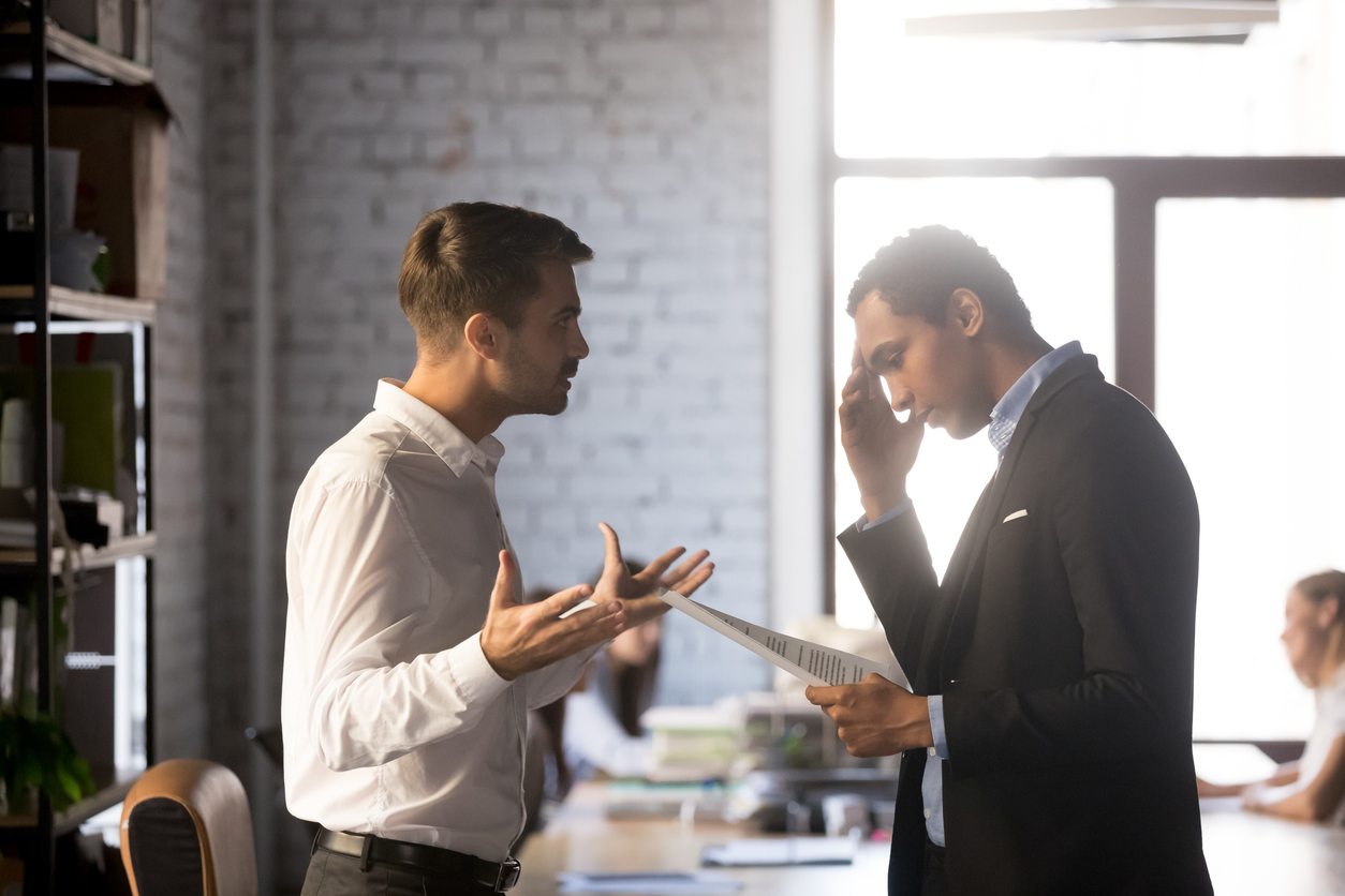 two coworkers in a conflict