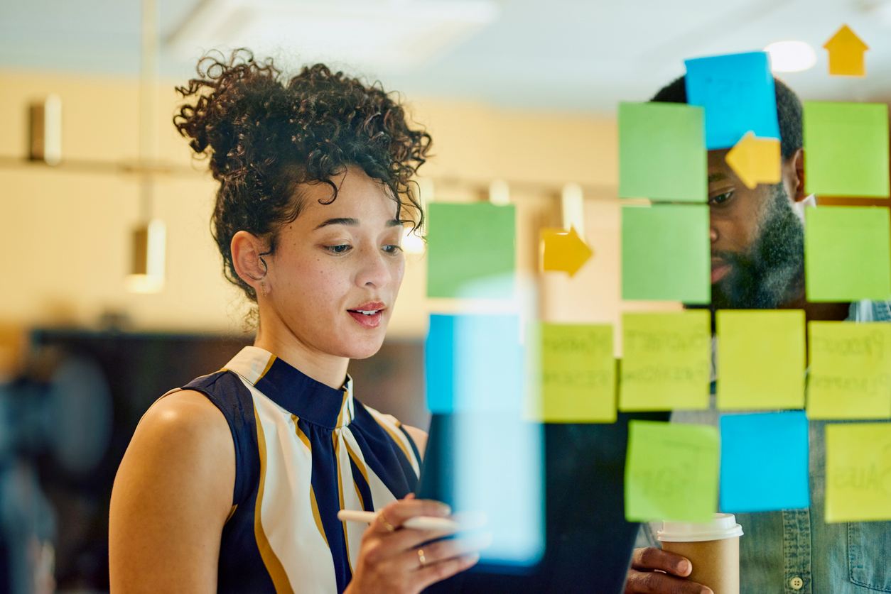 sticky notes on glass wall