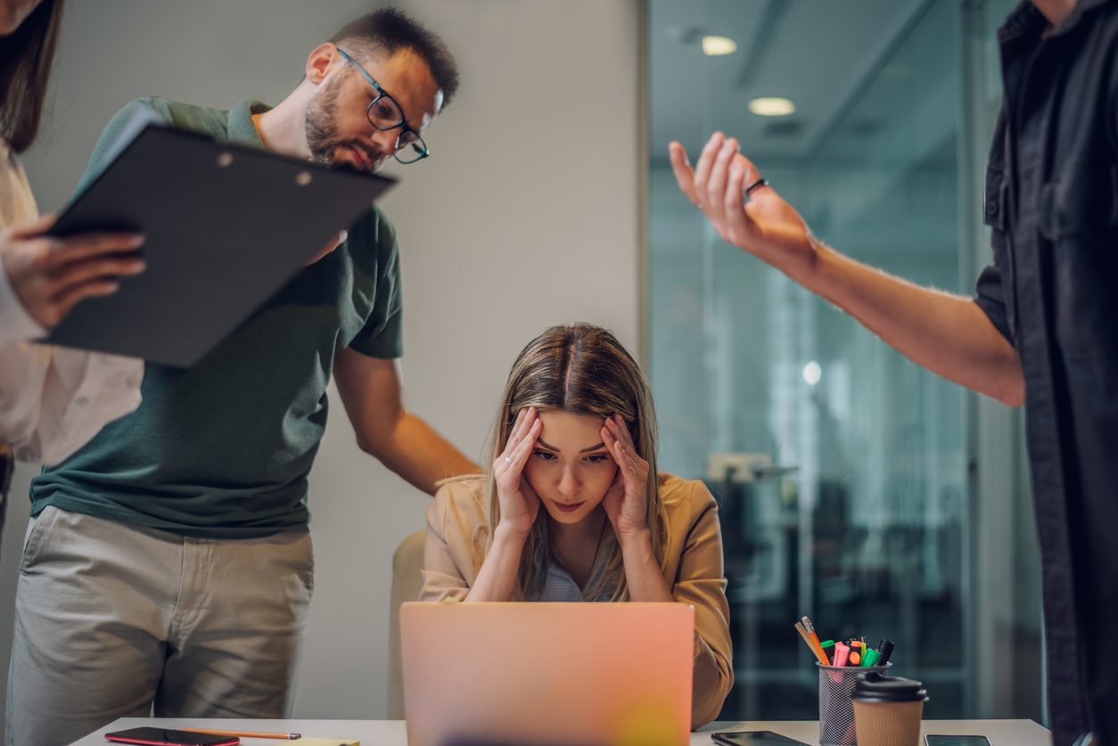 leader upset with angry team around her