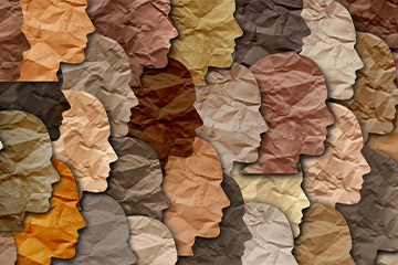 diverse group of paper profile cutouts representing diversity of a group