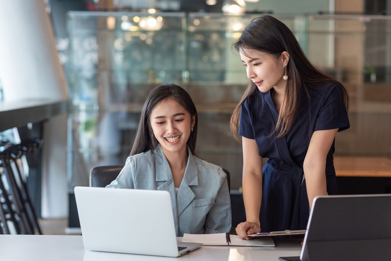 two female coworkers in office