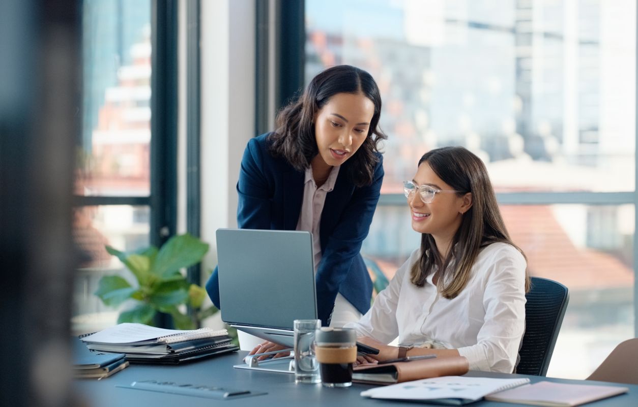 two female coworkers in office